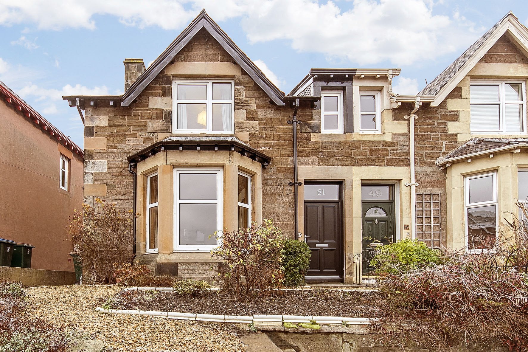 Elegant sandstone house with modern extension